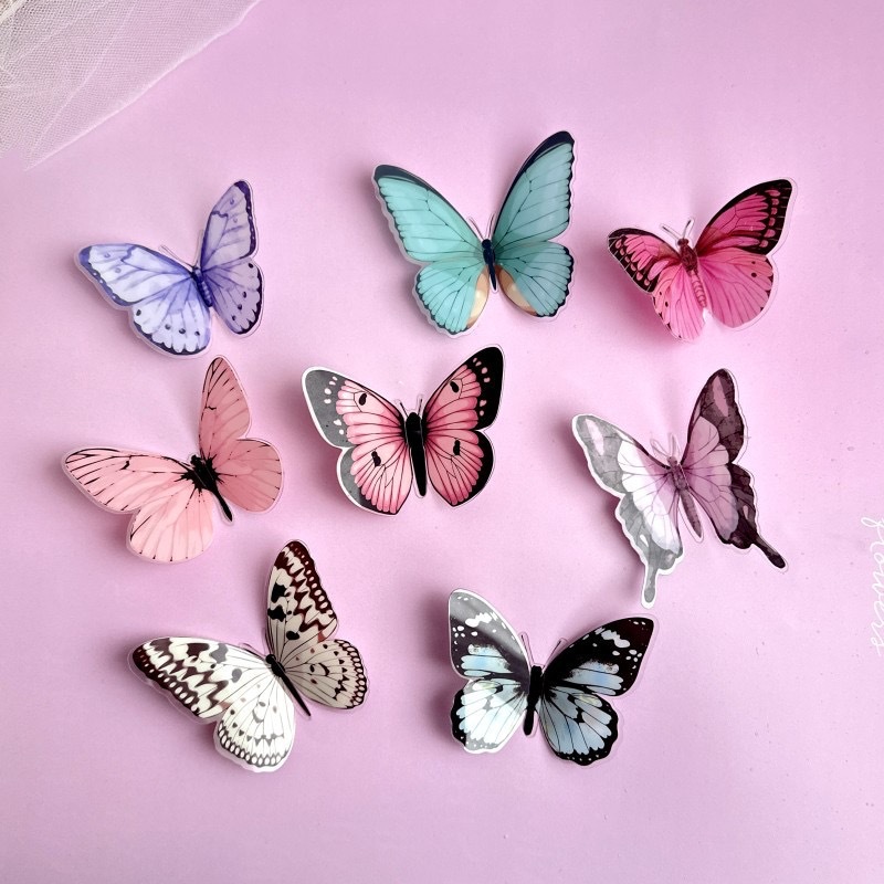 Ensemble de papillons en plastique coloré