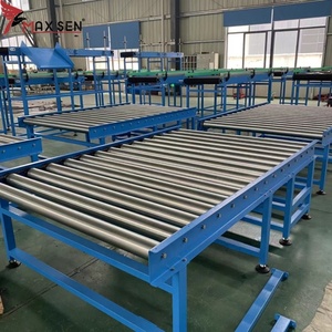 Máquina de carga de alta calidad, transportador de rodillos motorizado, transportador de rodillos accionado por cadena para transporte de cesta de rotación - Product Image 1
