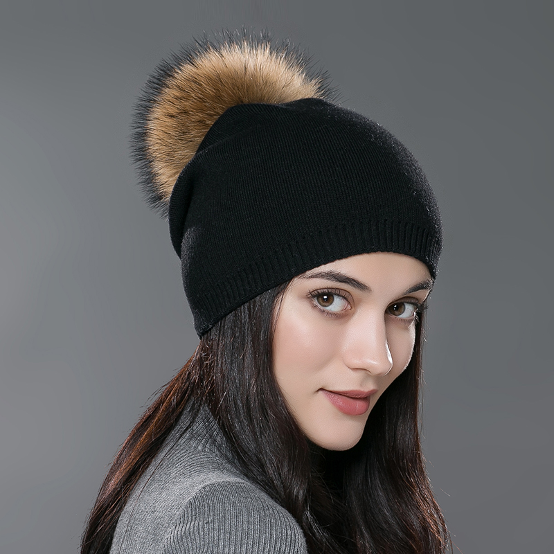Black with brown pom