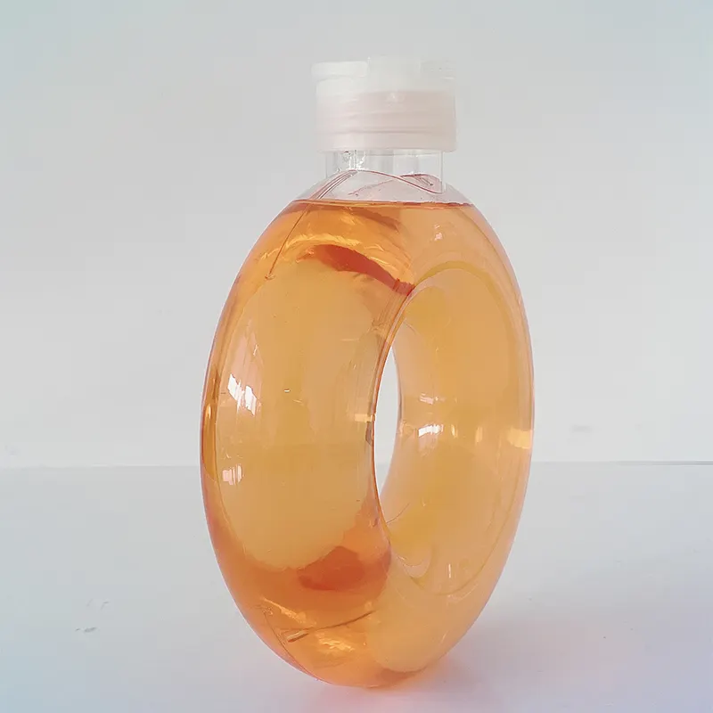 Botellas de plástico personalizadas con forma de Donut de 500ml con paquete de tapón de rosca Jugo fresco Agua Café