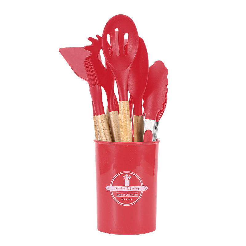 Juego de 12 utensilios de cocina rojos.
