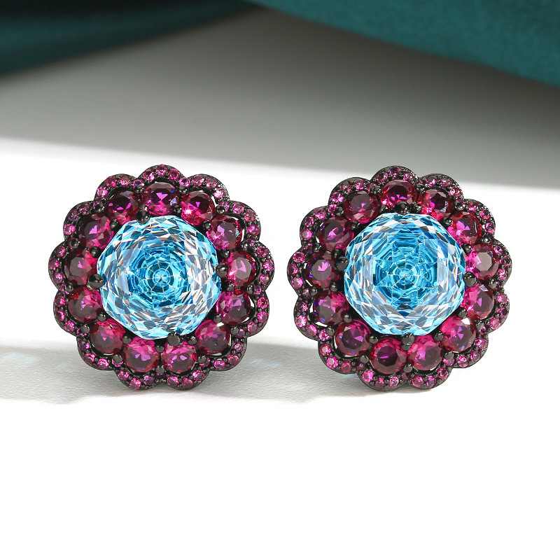 Black gold sea blue ear studs