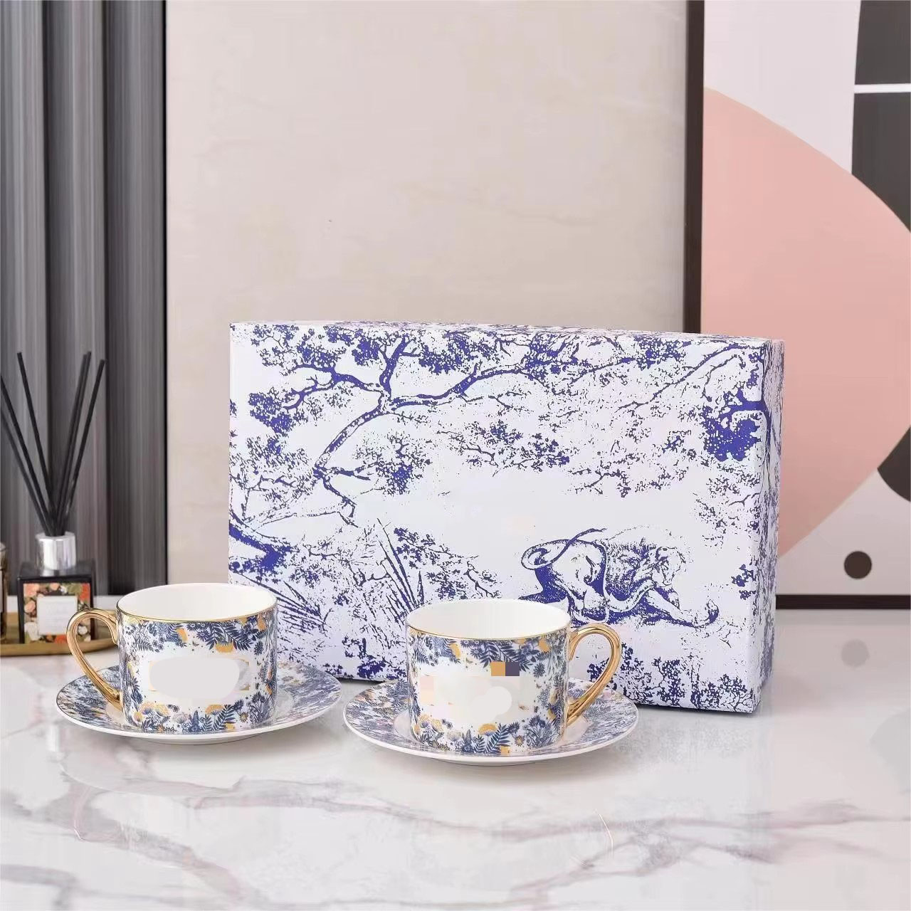 blue 2 cup and 2 saucer