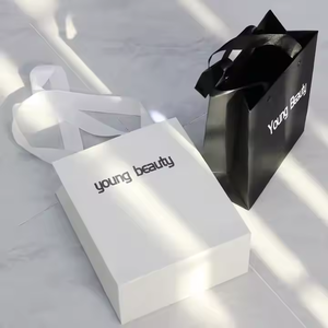 Impresión de bolsa de papel Kraft marrón liso con mango de cuerda trenzada Bolsas de papel personalizadas con su propio logotipo - Product Image 2