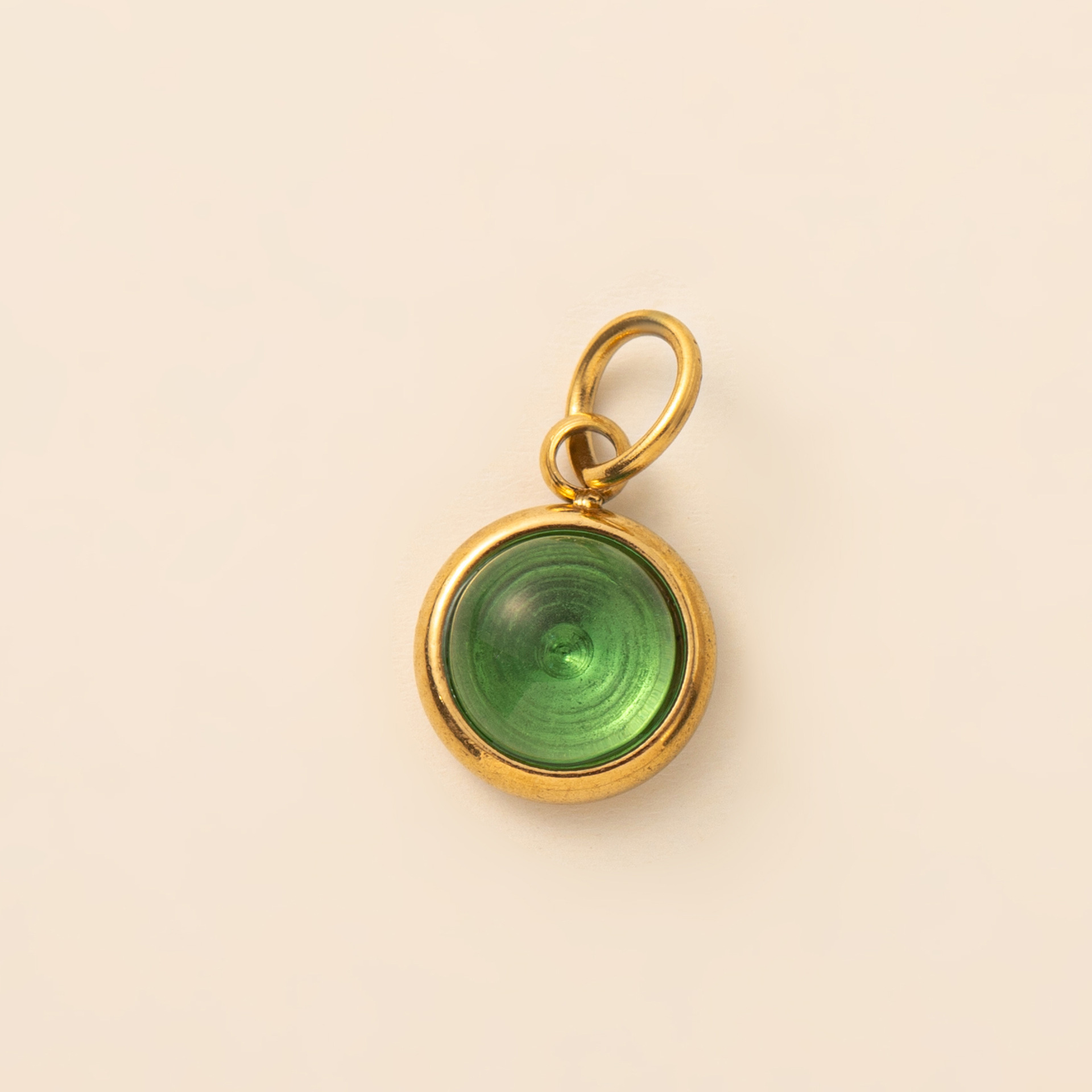12 round green zircon pendant