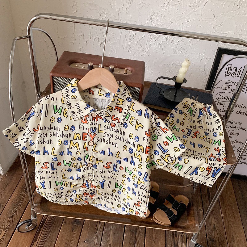 Camicia abito-crema lettere