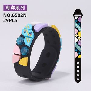 ABS Plastic Small Particle DIY <span class=keywords><strong>Candy</strong></span> Color <span class=keywords><strong>Building</strong></span> <span class=keywords><strong>Block</strong></span> Bricks Parts Silicone Bracelet Toy para crianças Interactive Gift 6 + anos