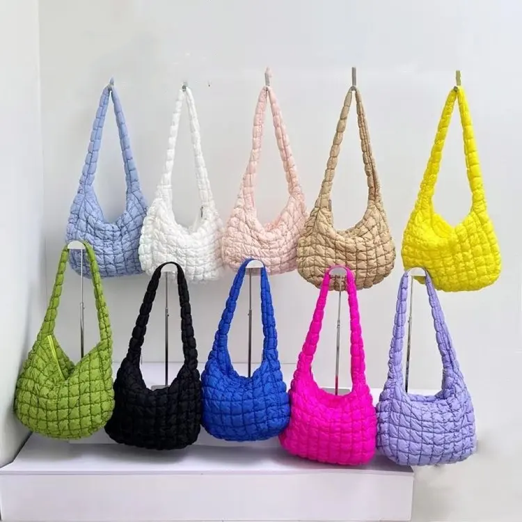 Bolso de hombro acolchado de gran capacidad estilo INS personalizado, bolso de mano de nailon acolchado suave para mujer, bolso de mensajero de colores caramelo