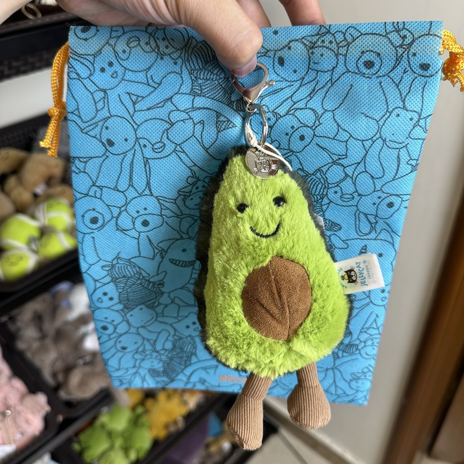 Pendentif avocat - 9-11cm, sac anti-poussière avec étiquette.