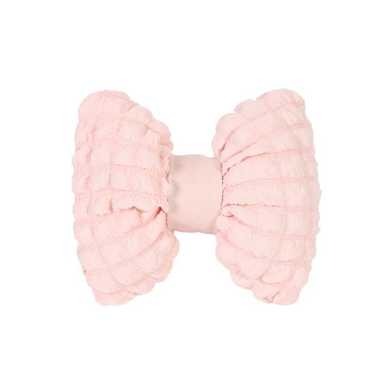 Appui-tête en pâte feuilletée rose
