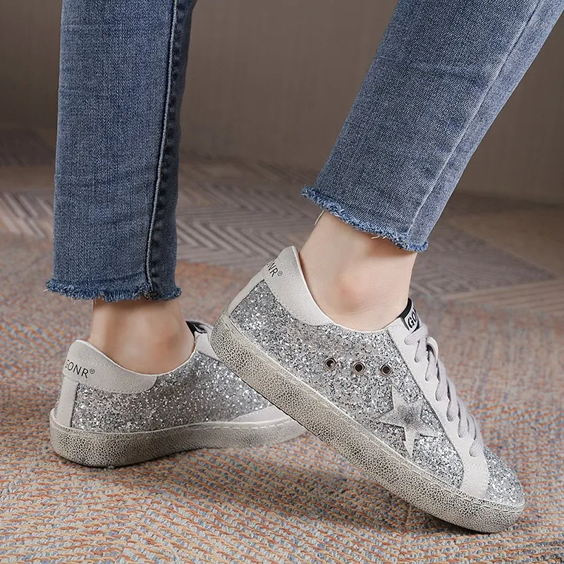 Zapatillas de deporte doradas de diseño para mujer, zapatillas de deporte de ganso blanco con estrella de bola, zapatos informales clásicos plateados con purpurina brillante de lujo