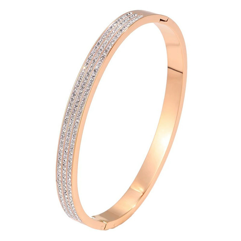 Bracelet en or rose 333 à trois rangées de diamants