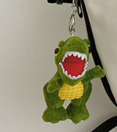 Pendentif tyrannosaure rex marron + vert