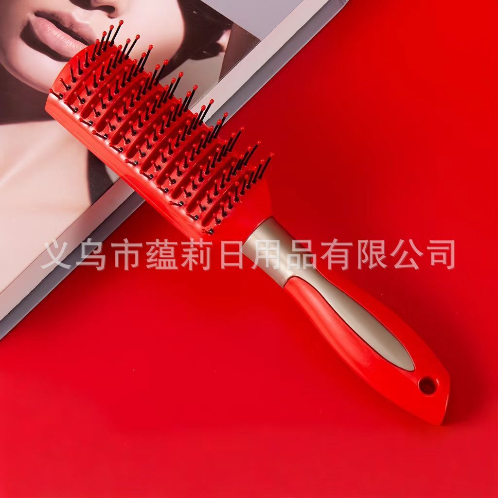 Red openwork straight hair comb with gold center ring