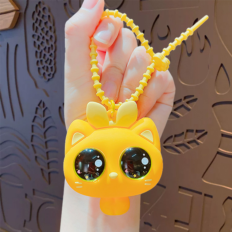 Pendentif musical pincé chat gros yeux-jaune