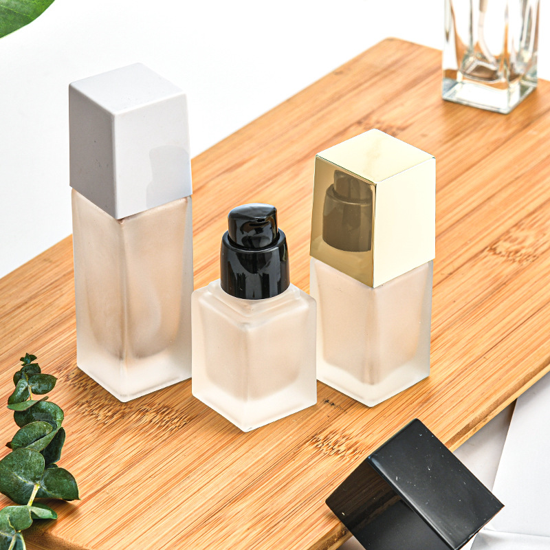 Bouteille en verre givré + tête de pompe lotion noire/tête de pompe de pulvérisation