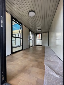 革新紧急住房钢和夹芯板集装箱房屋，提供从危机到办公室应用的舒适