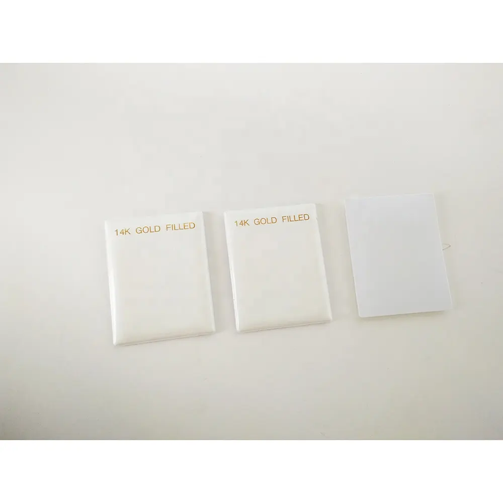 Soporte de plástico PVC para exhibir joyas, 5,5x5,5 CM, color blanco, con papel de aluminio dorado
