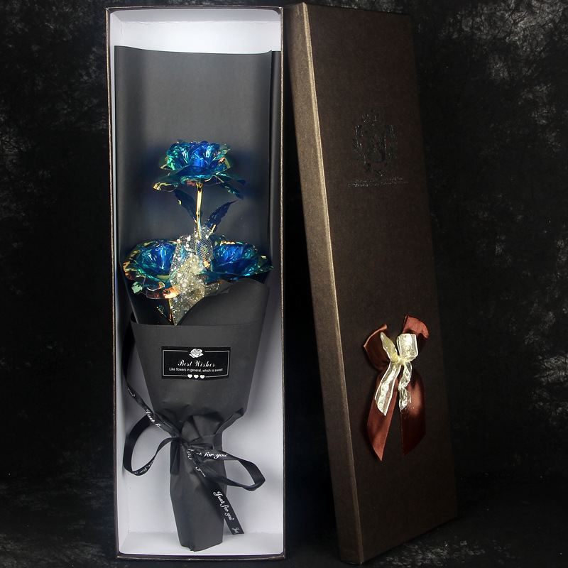 3 gold colored blue flowers