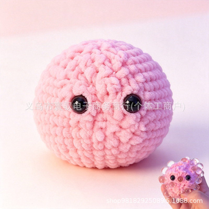 Boule squishy tricotée rose