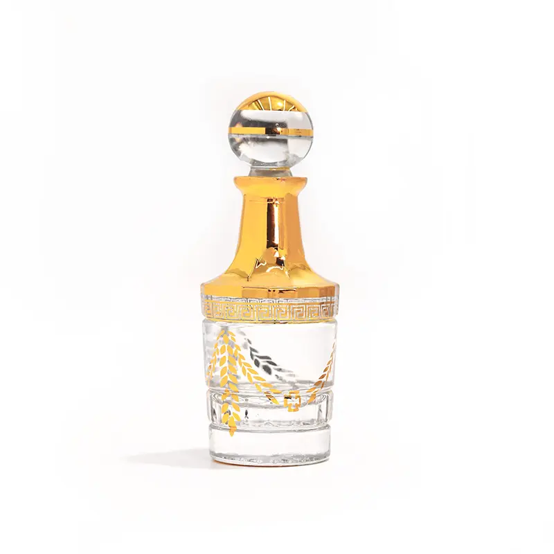 Venta caliente árabe Medio Oriente Dubai vidrio aceite esencial perfume 250ml electrochapado láser tallado retro botella de Oro Grande