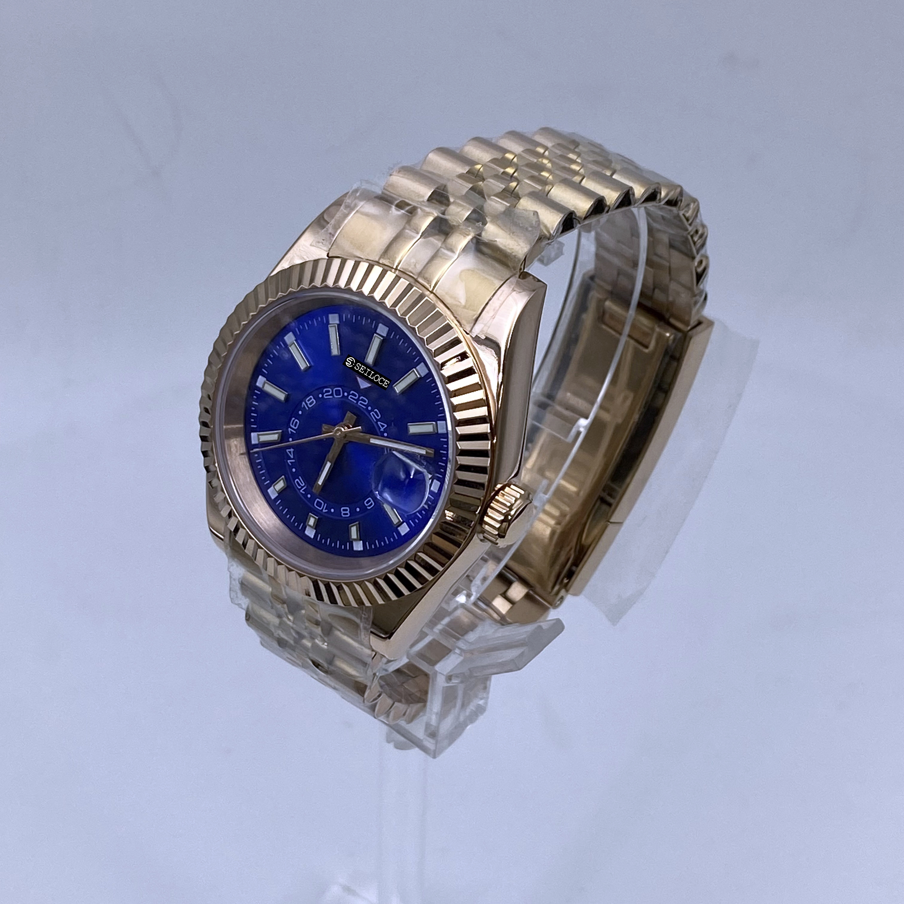 Caja de oro rosa + esfera azul oscuro