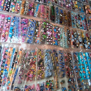 Bán buôn 50000 + Thiết kế chất lượng cao UV dtf Libbey bọc chuyển 40oz 20oz 16oz phim hoạt hình thủy tinh có thể in UV dtf cup kết thúc tốt đẹp - Product Image 1