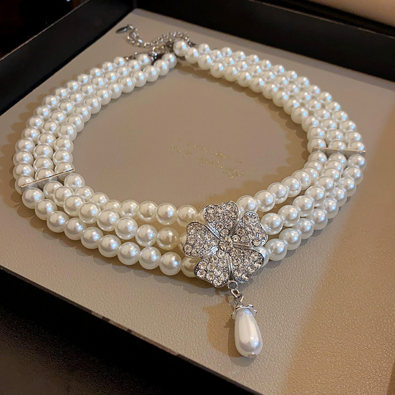 flower-shaped multi-layer necklace with diamonds, pearls 7mm