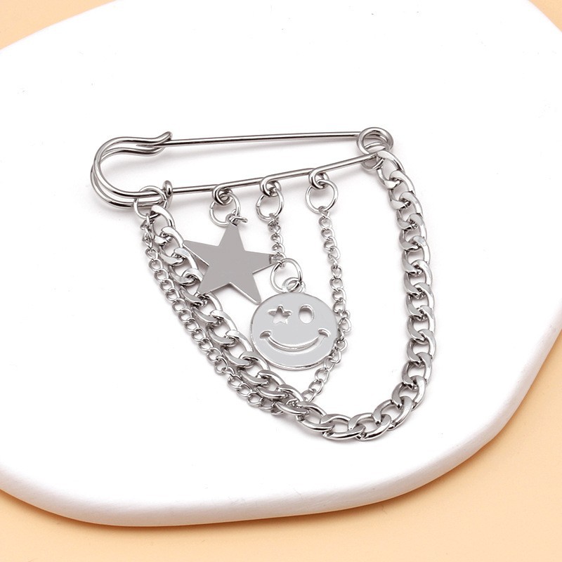 Broche double couche croix incrustée de diamants