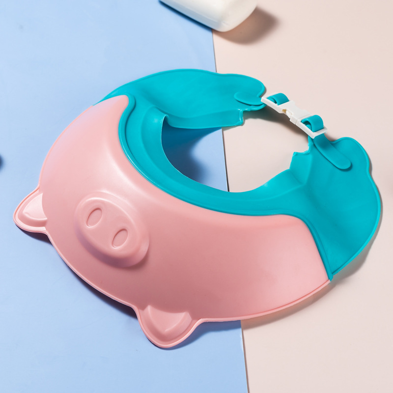 Bonnet de shampoing cochon rose