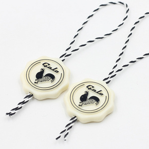 Custom 3d Embossed Brand Name Logo Garment <strong>String</strong> <strong>Loop</strong> Plastic Seal <strong>Tag</strong> Sustainable <strong>Hang</strong> <strong>Tag</strong> <strong>String</strong> Lock - Product Image 1