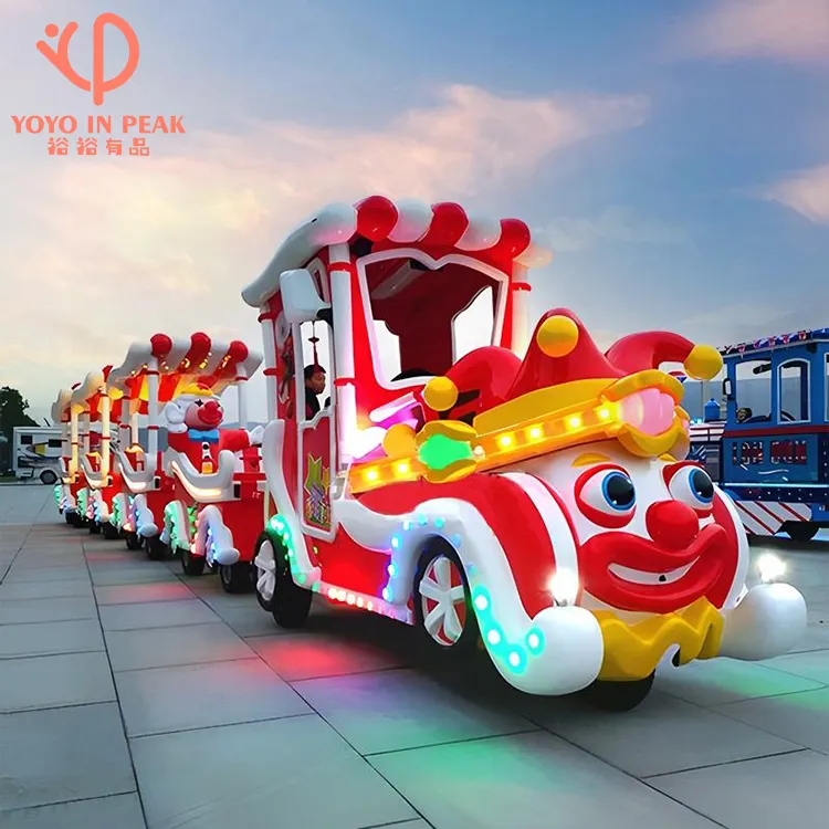 Nuevos juegos Funfair Rides Kiddie Fiberglass Wagon Payaso Batería Mini tren sin rieles a la venta