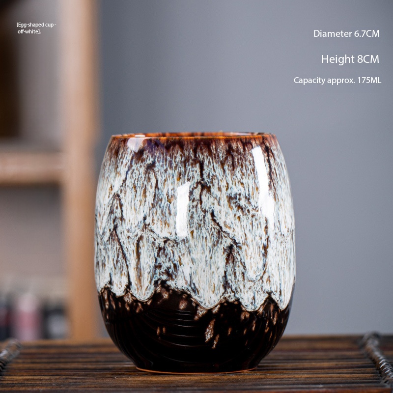 Taza en forma de huevo blanca