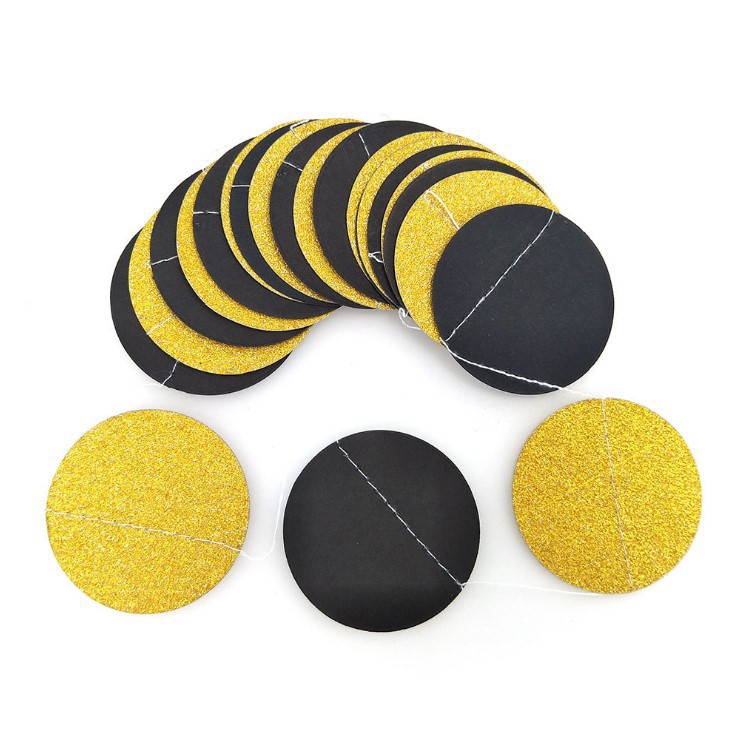 Feuille ronde noire dorée