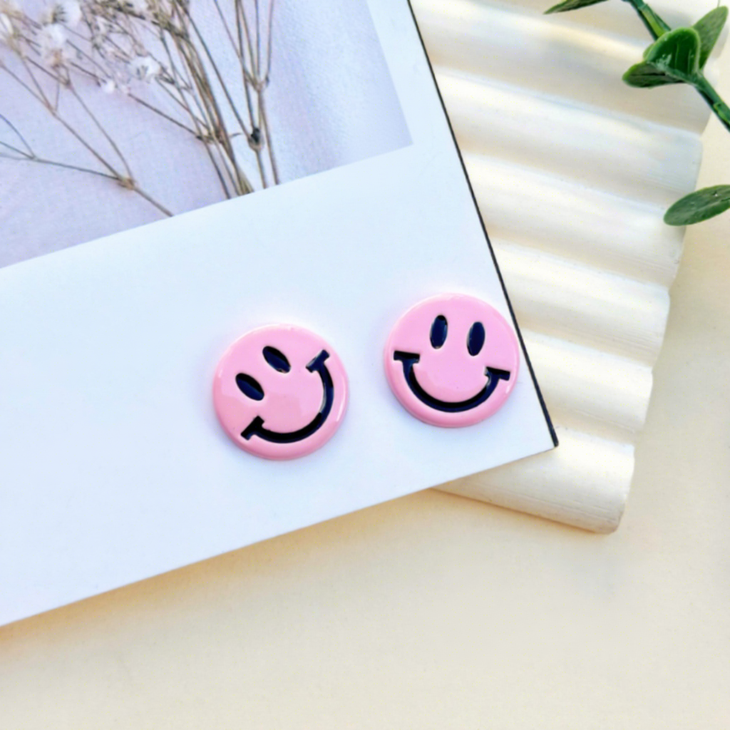 Cara sonriente rosa 17*17mm