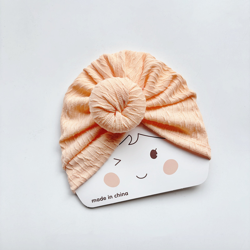 Orange donut hat-textured edges