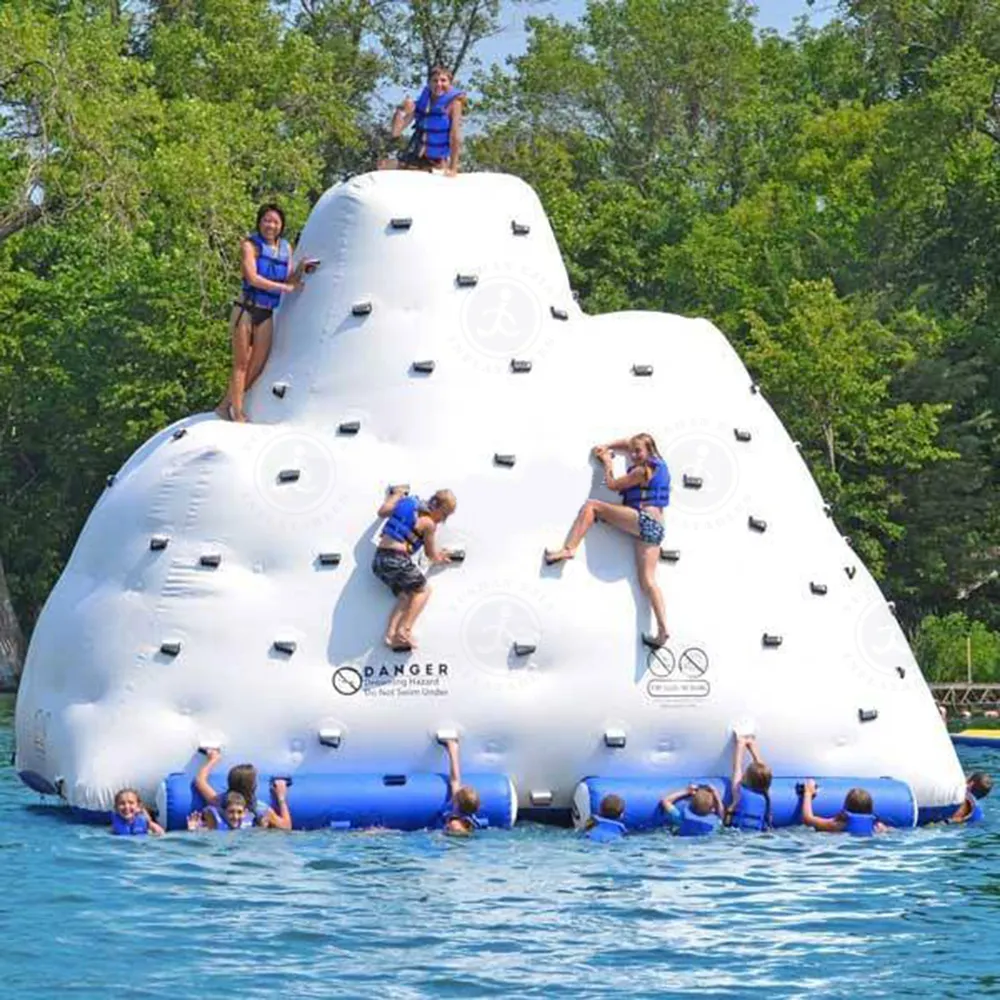 Customized Size 0.9mm PVC Large Water Iceberg Floating Rock Toys Games Climbing Wall Slide Inflatable Iceberg For Adults
