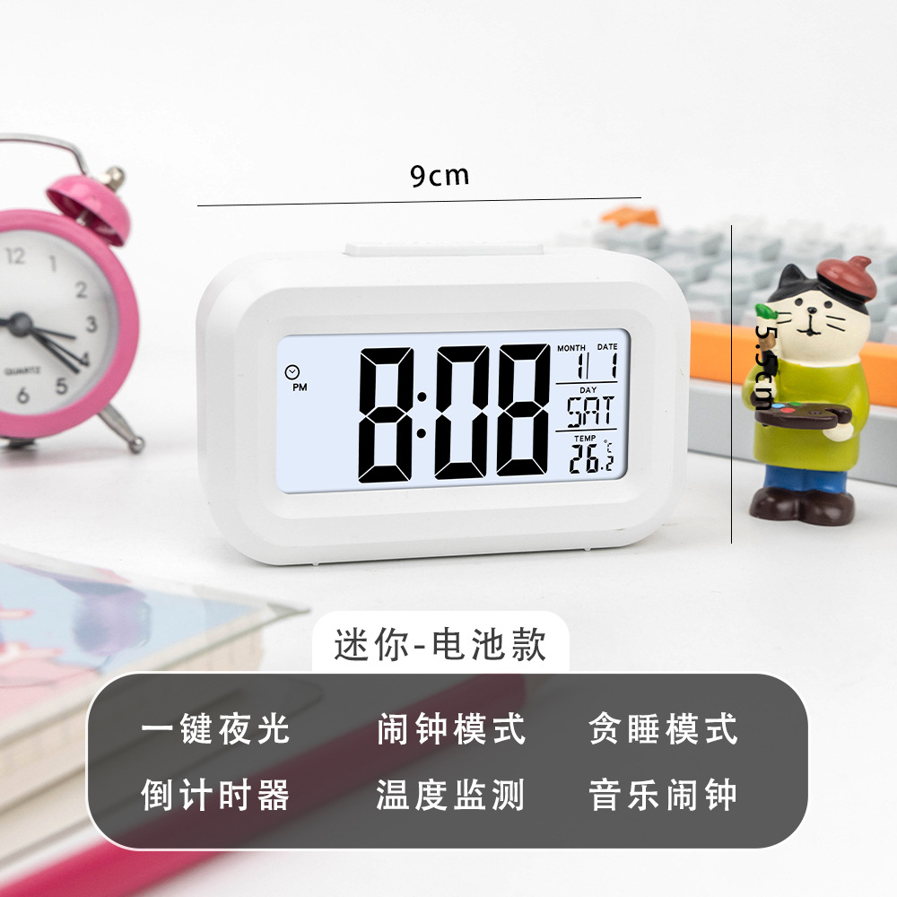 Reloj despertador multifuncional blanco que brilla en la oscuridad