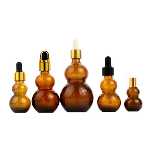 10ml 20ml 30ml 50ml 100ml ขายส่งขวดน้ํามันหอมระเหยแก้วรูปมะระอําพันพร้อมหยด - Product Image 1