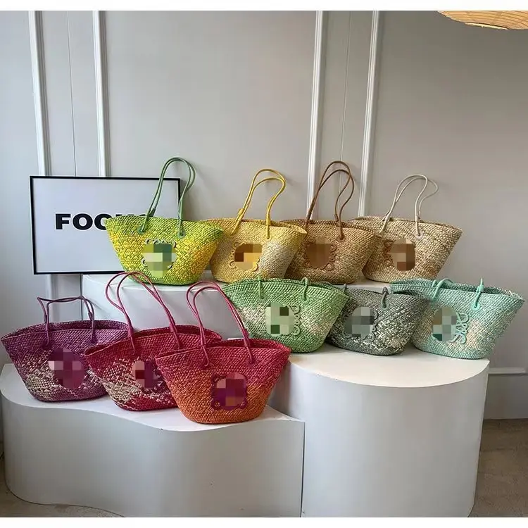 Borsa 2024 di design primavera estate tessuto di paglia borsa da donna moda colorata a righe grande borsa da spiaggia a tracolla stile Niyang