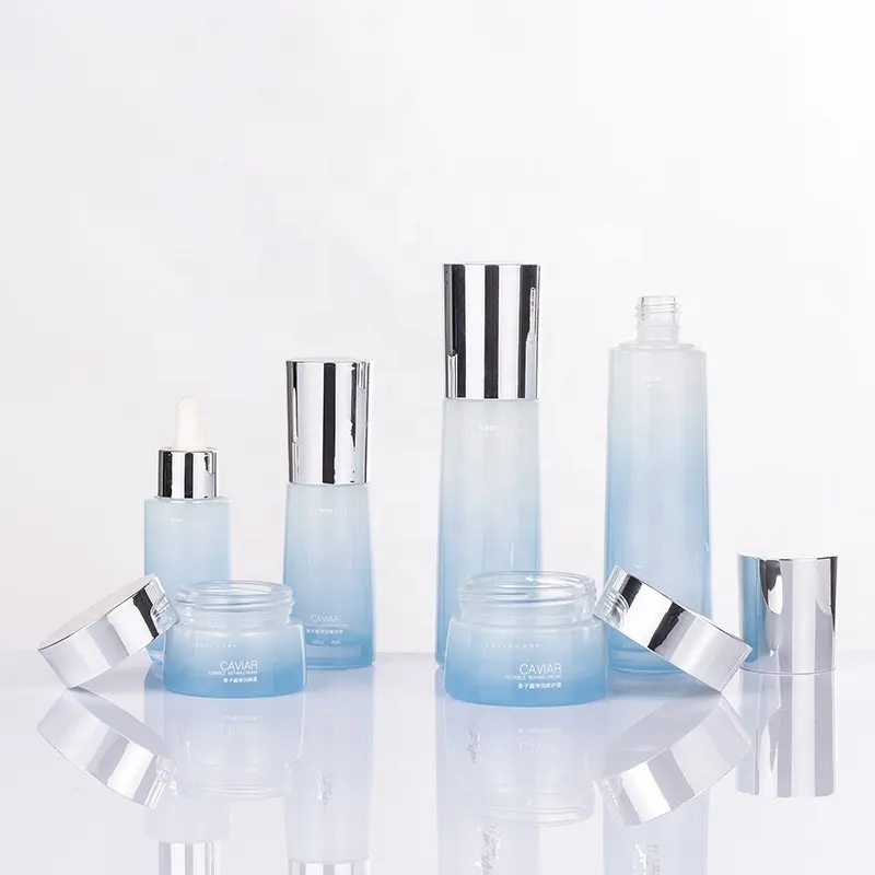 Luxus elegante Glas verpackung Set Hautpflege Kosmetik Creme Glas Behälter blau gefrostete Sprüh flasche mit silberner Pumpe