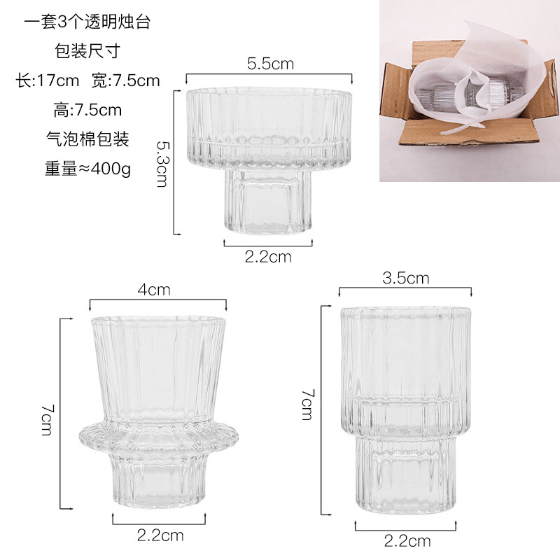 Ensemble de trois bougeoirs en verre transparent