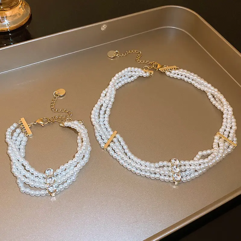 Collana di perle di diamanti multistrato con catena alla moda