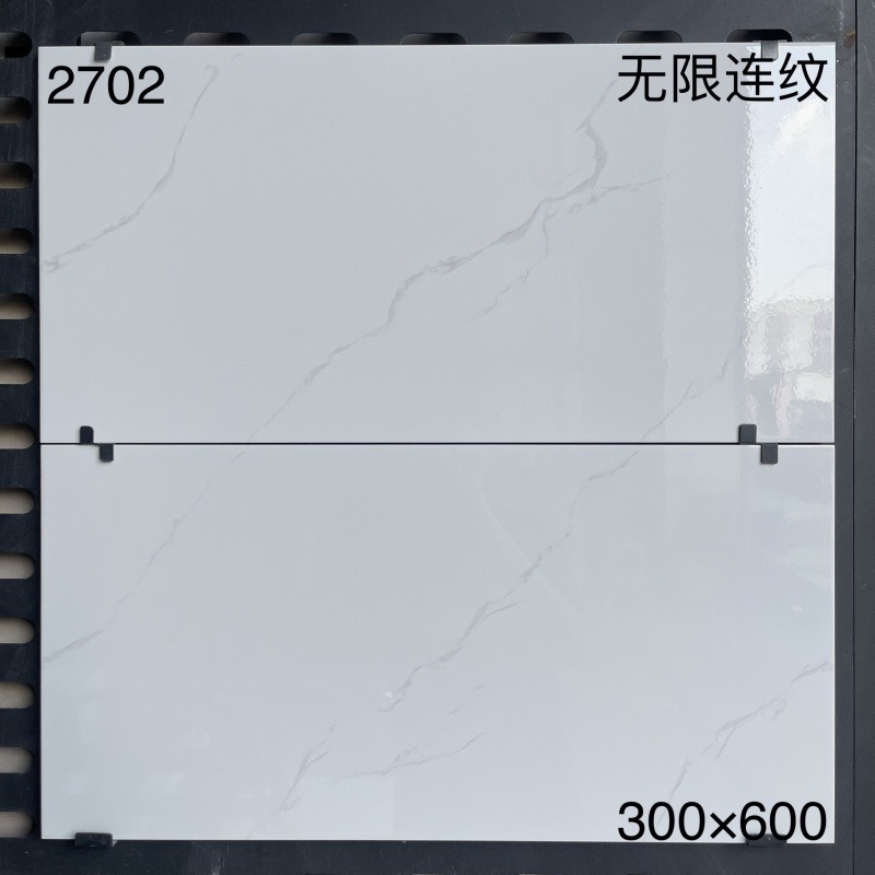 2702