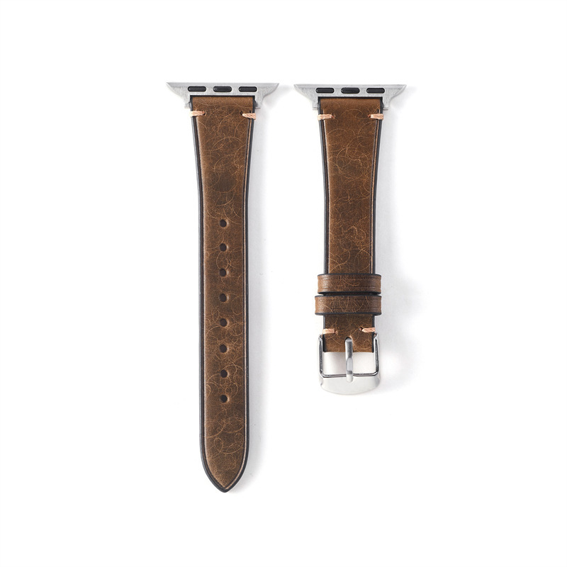 Boucle argentée, bracelet olive.
