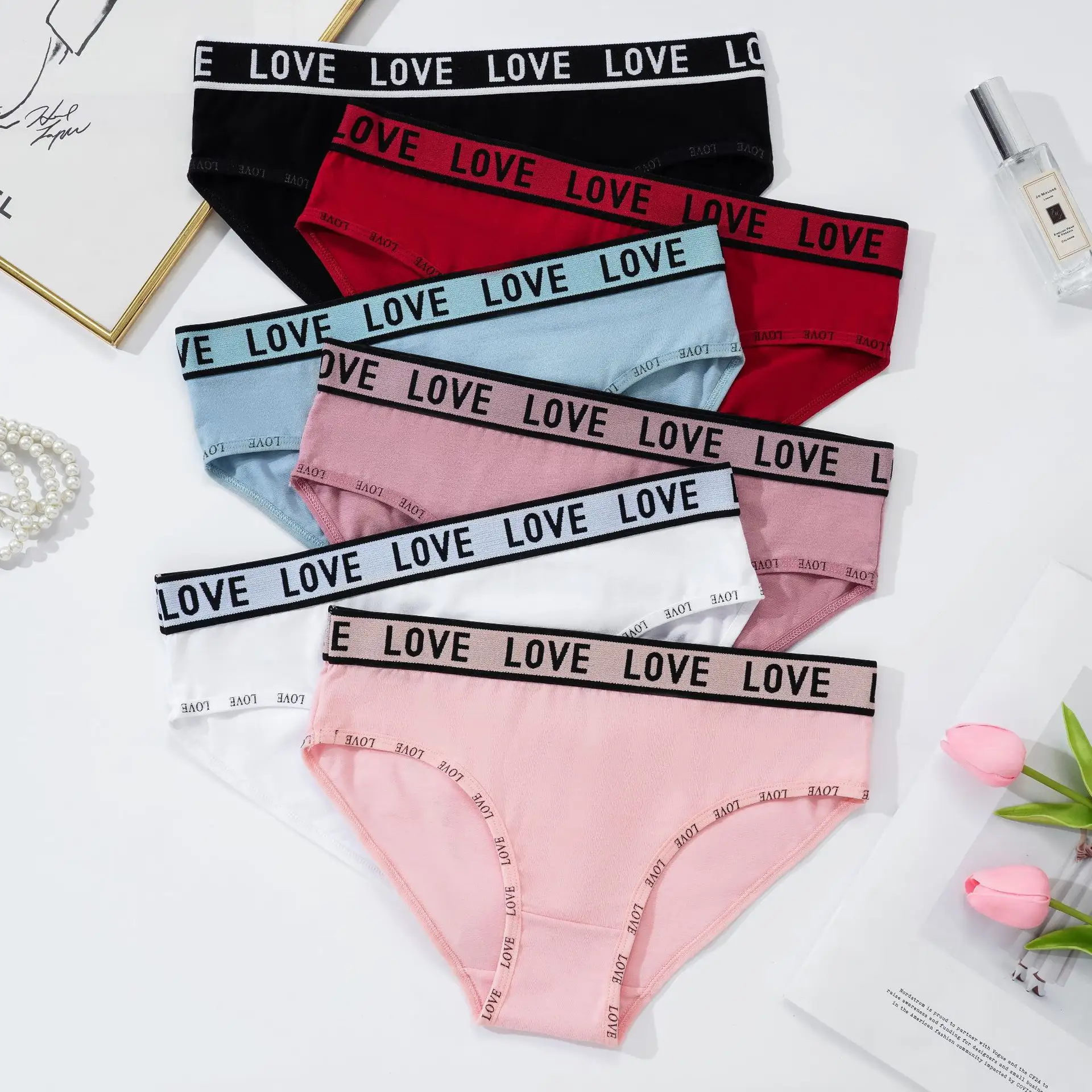 Stock en vrac pas cher sous-vêtements pour dames 95% coton avec logo et ceinture culotte unie couleur blanc rose slip pour filles
