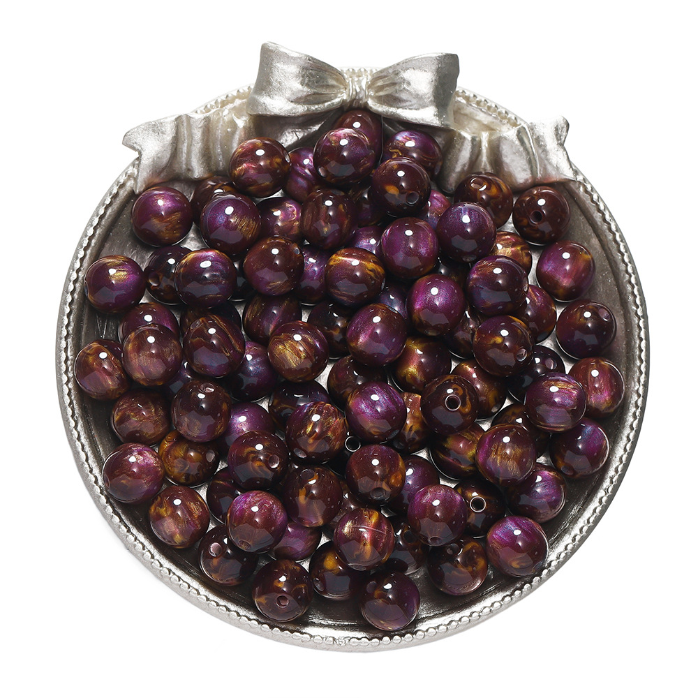 Resin cat's eye beads - orange-purple