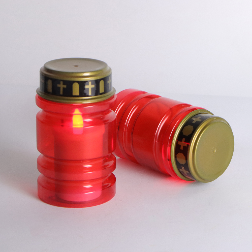 Bougie chauffe-plat intégrée à coque rouge avec bande concave.