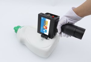 Macchina di codifica per acqua bottiglia di Pet iniettare stampante data di scadenza macchina da stampa automatica stampante a getto d'inchiostro iniettare stampa 12.7mm