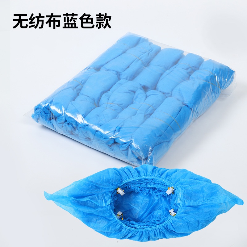 Cubrezapatos desechables azules de tela no tejida (50 unidades)